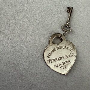 Tiffany & Co. “Please Return to Tiffany” Padlock & Key Charm – Sterling Silver